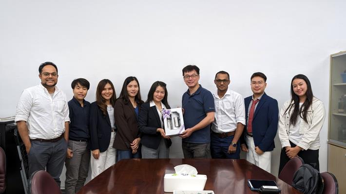 Dept. Head Prof. Tang-Long Shen, Associate Professor Hiran A. Ariyawansa, and the delegation from Chiang Mai University pose for a photo